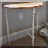 F37. Painted half moon table. 